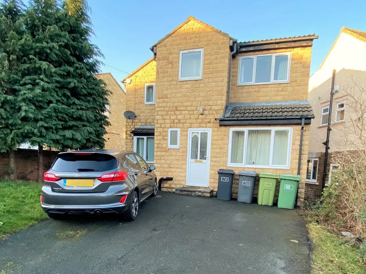 Front exterior and off-street parking at Lynton Avenue 10a, Huddersfield