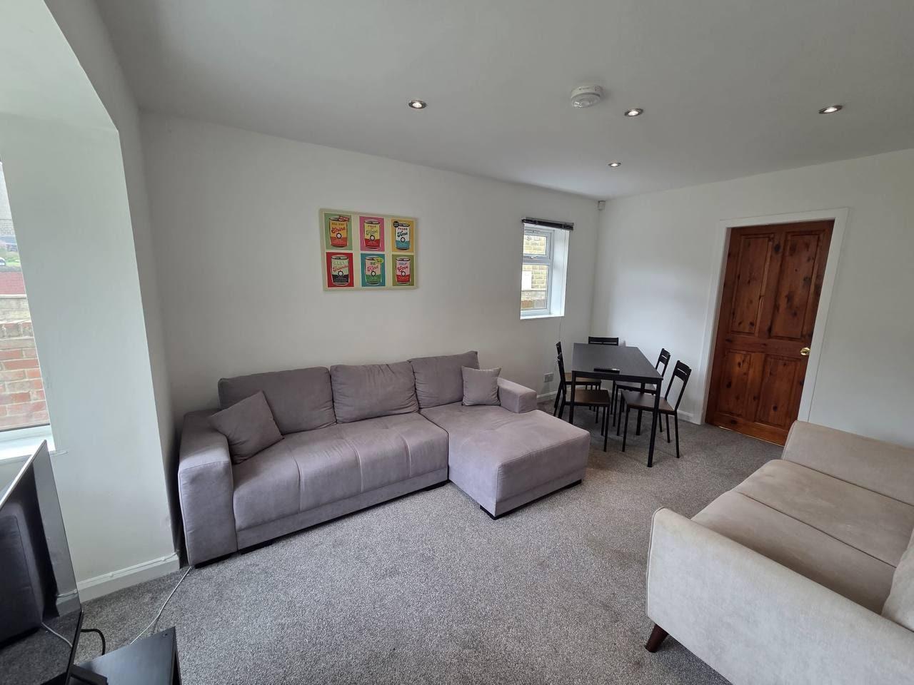 Second lounge with a corner sofa and dining space — Lynton Avenue 10a, Huddersfield